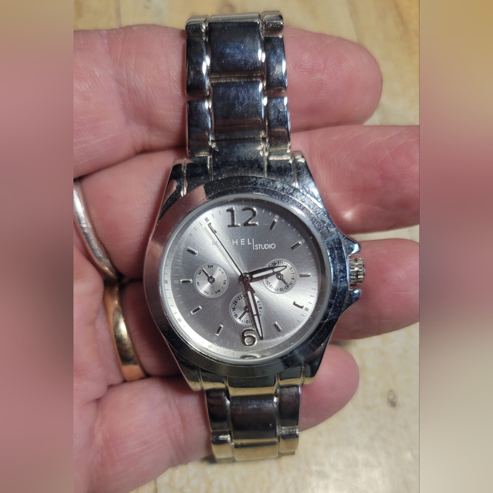 Men's silver dress watch in like new